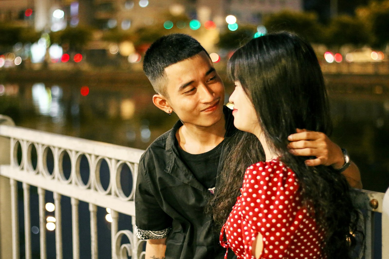 Woman in black leather jacket holding her hair - Love marriage and relationship problem guidance
